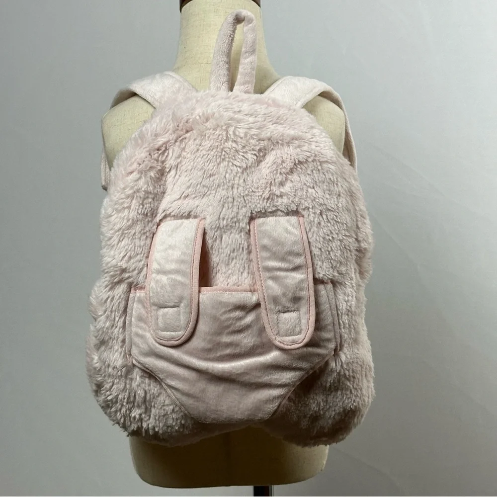 BABY & CHILD pink fuzzy kid's backpack w/ ride along for a plush buddy